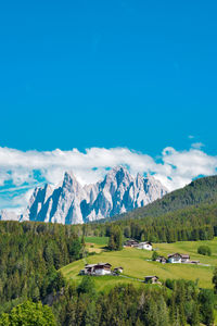 Scenic view of mountains against clear blue sky