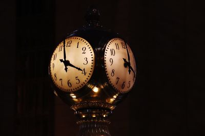 Close-up of illuminated clock