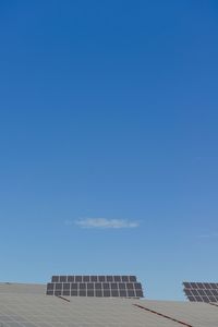 Solar panels against blue sky