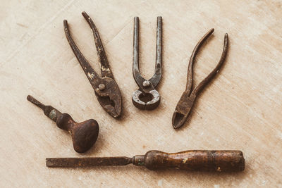 High angle view of rusty metal on table