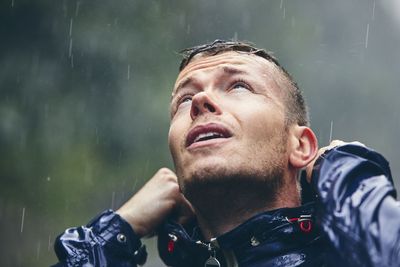 Man wearing raincoat outdoors