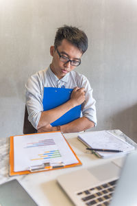 Young man working at office