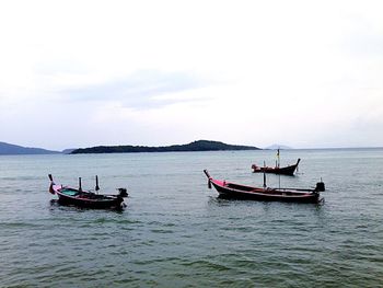 Boat sailing in sea