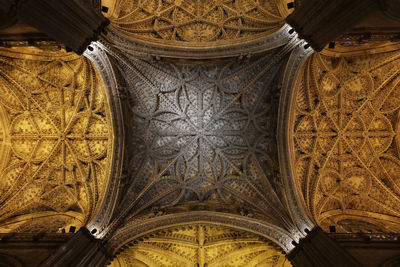 Low angle view of ornate ceiling of building