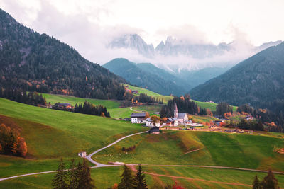 Scenic view of landscape and mountains against sky