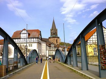 Buildings in city against sky
