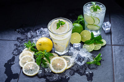 Various fruits in glass on table