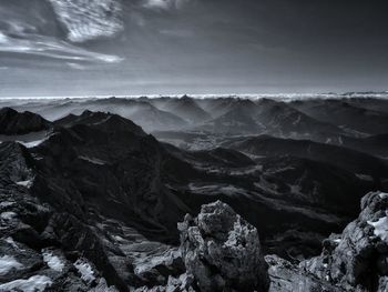 Scenic view of snowcapped mountains against sky