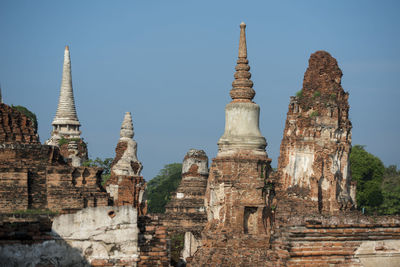Low angle view of old built structures at wat mahathat