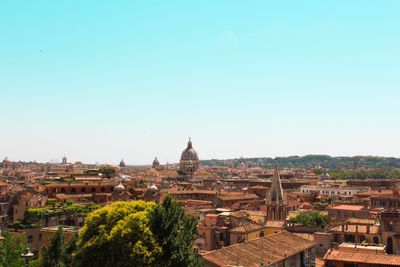 High angle view of buildings against clear sky
