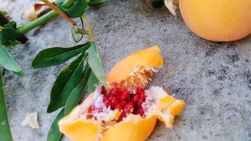 High angle view of chopped fruits in container