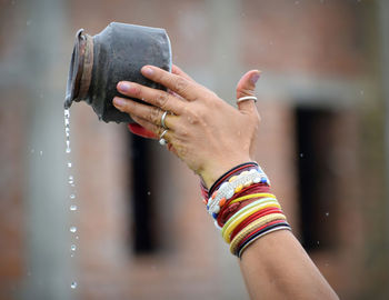 Close-up of woman holding hands