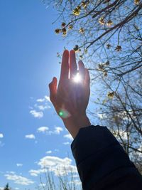 Low angle view of man against sky