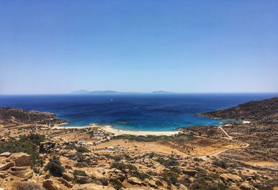 Scenic view of sea against clear blue sky