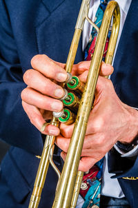 Close-up of man holding hands