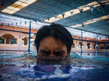 Portrait of woman in swimming pool