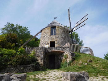 Low angle view of historical building against sky