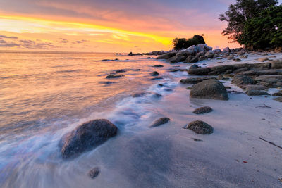 Scenic view of sea against sky during sunset