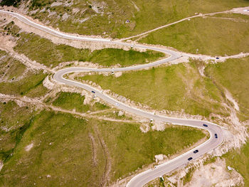 High angle view of winding road on land