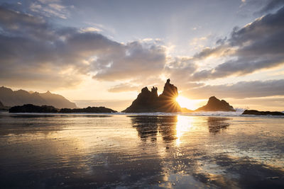 Scenic view of sea against sky during sunset