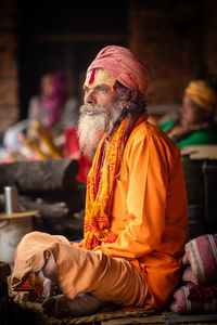 Midsection of man at temple