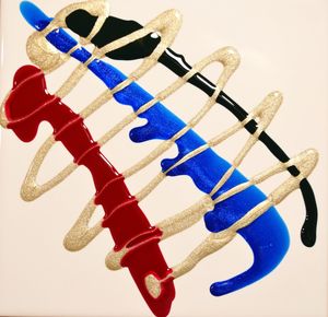Close-up of colored pencils over white background
