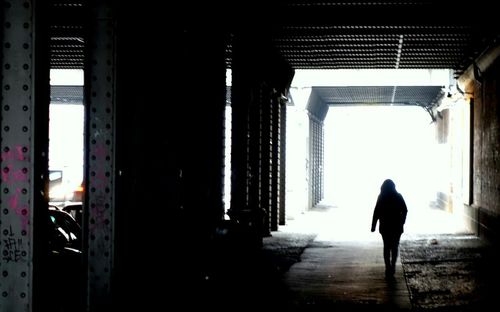 Woman standing in front of building