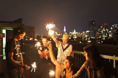 Friends hanging out on a rooftop