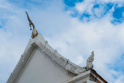 Low angle view of statue against sky