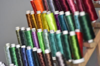 Close-up of multi colored pencils in row