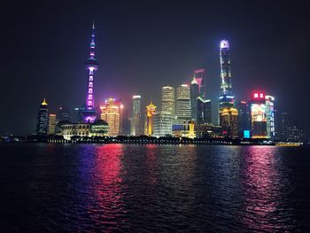 Shanghai illuminated buildings in city at night