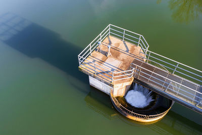 High angle view of boat floating on lake