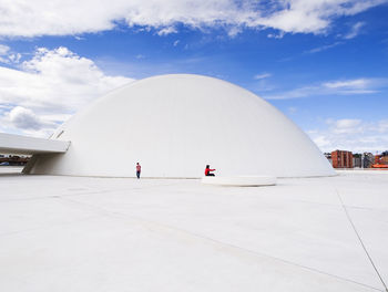 White building against sky in city