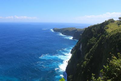 Scenic view of sea and blue sky