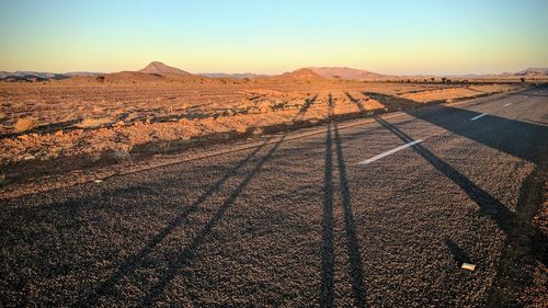 Scenic view of desert against clear sky