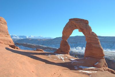 View of desert against blue sky