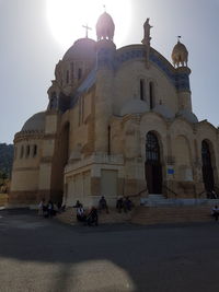 People in front of historical building