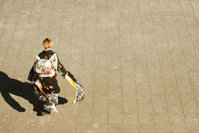 Close-up of woman standing in pond