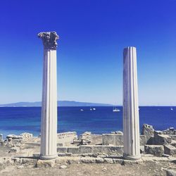 Scenic view of sea against clear blue sky