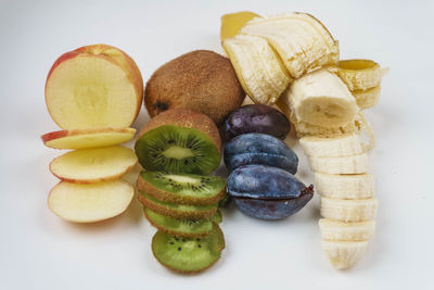 Close-up of fruits against white background