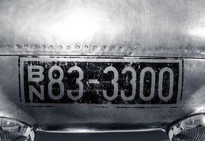 Close-up of text on old car