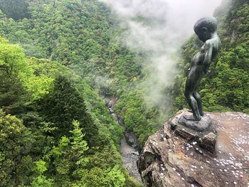 View of statue against trees