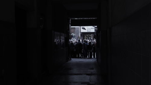 Man in illuminated corridor