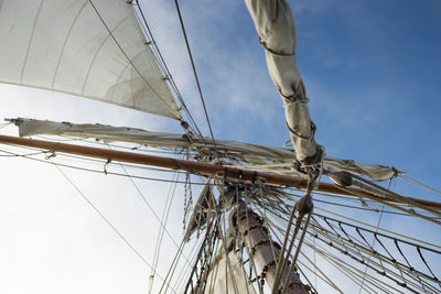 Low angle view of sailboat sailing against sky