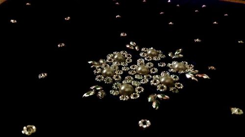 Close-up of flowers against black background