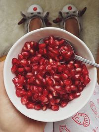 High angle view of strawberries in bowl on table