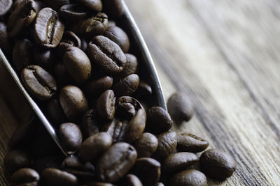 High angle view of roasted coffee beans on table