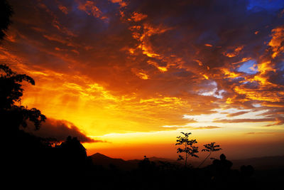 Scenic view of dramatic sky during sunset