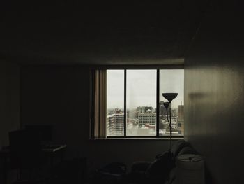 Buildings seen through darkroom window