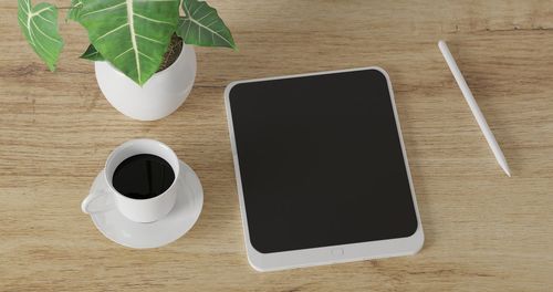 High angle view of coffee cup on table